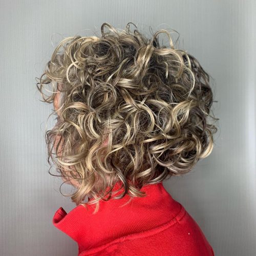 A brusque curly bob is a textured haircut which length ranges from ear to jaw eleven Cutest Short Curly Bobs for Curly Hair Girls