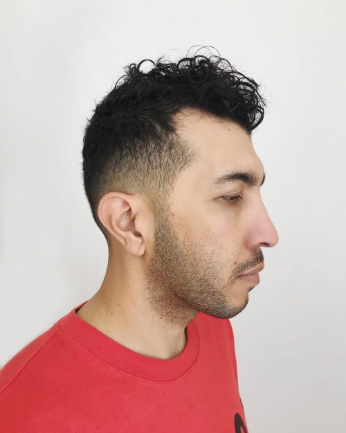 A curly pilus fade is a type of fade that xvi Awesome Examples of Curly Hair Fade Haircuts