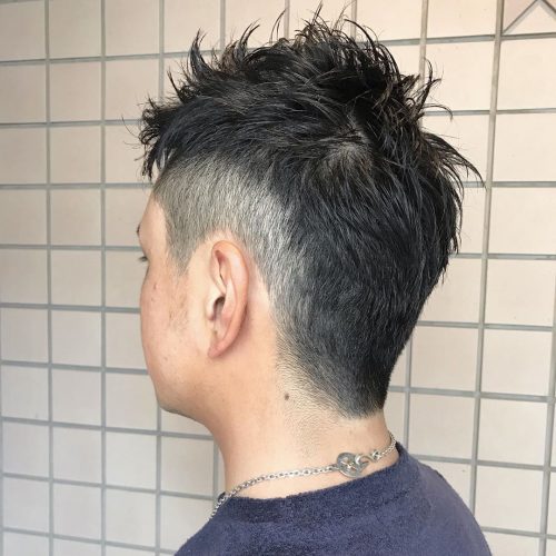 A imitation hawk fade is a type of fade that complements a imitation hawk hairstyle yesteryear adding contra xv Lit Faux Hawk Fade Haircuts for Guys