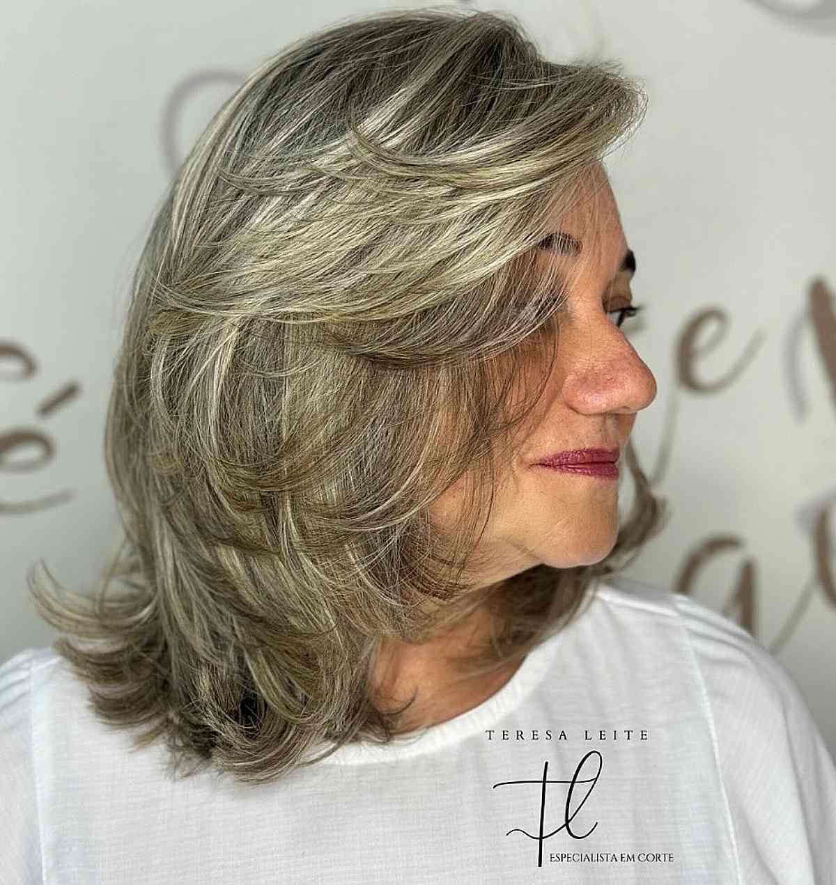 Thick Shoulder-Length Grey Feathered Haircut for Women Over 60