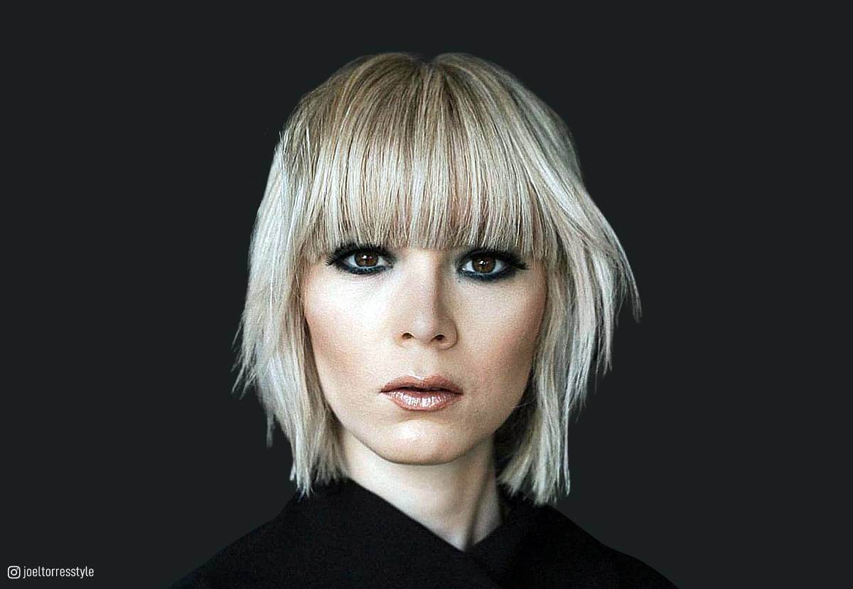 Image of Blunt layered bob with bangs for fine hair