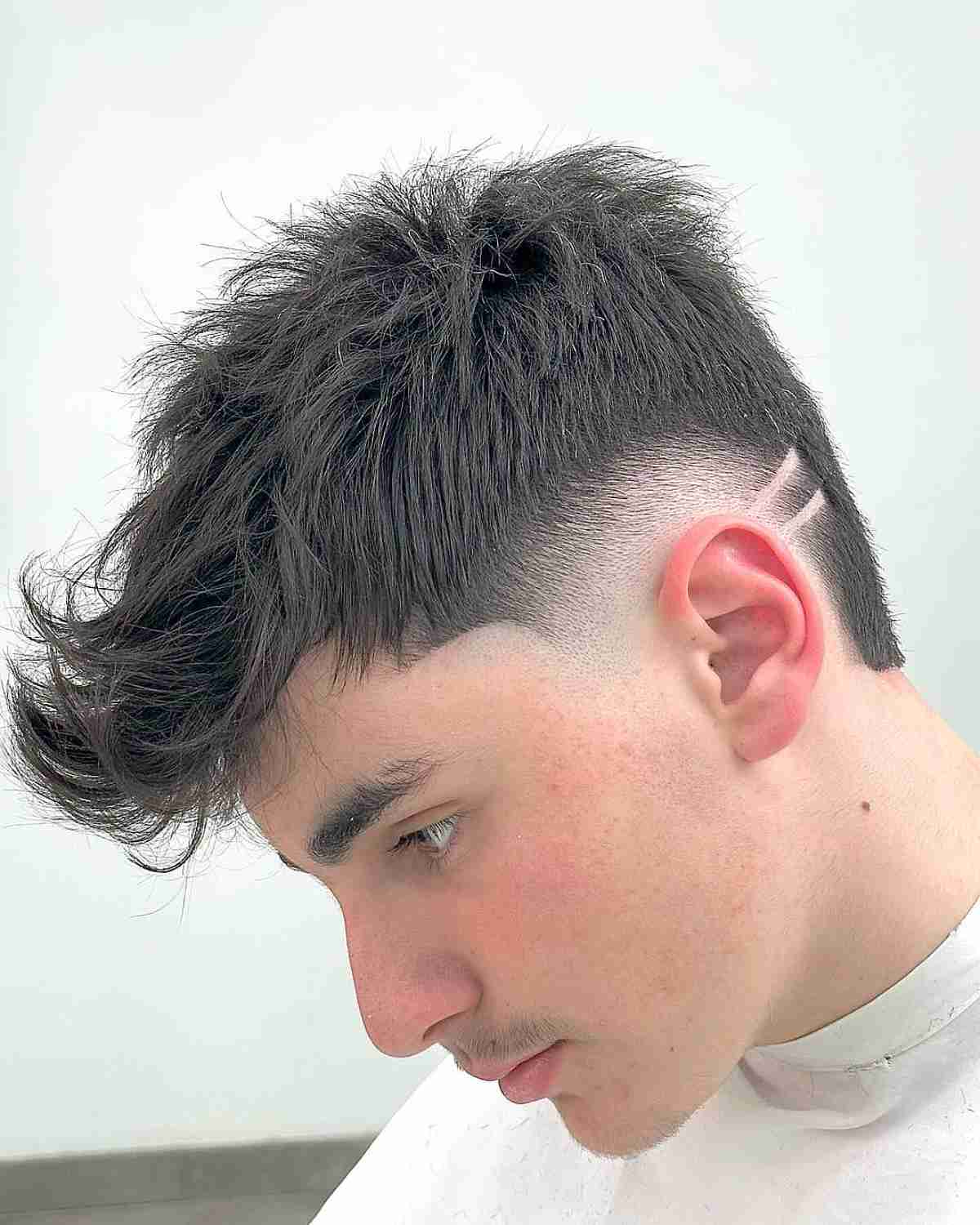 Tousled Quiff with Shaved Lines and Burst Fade for Men 