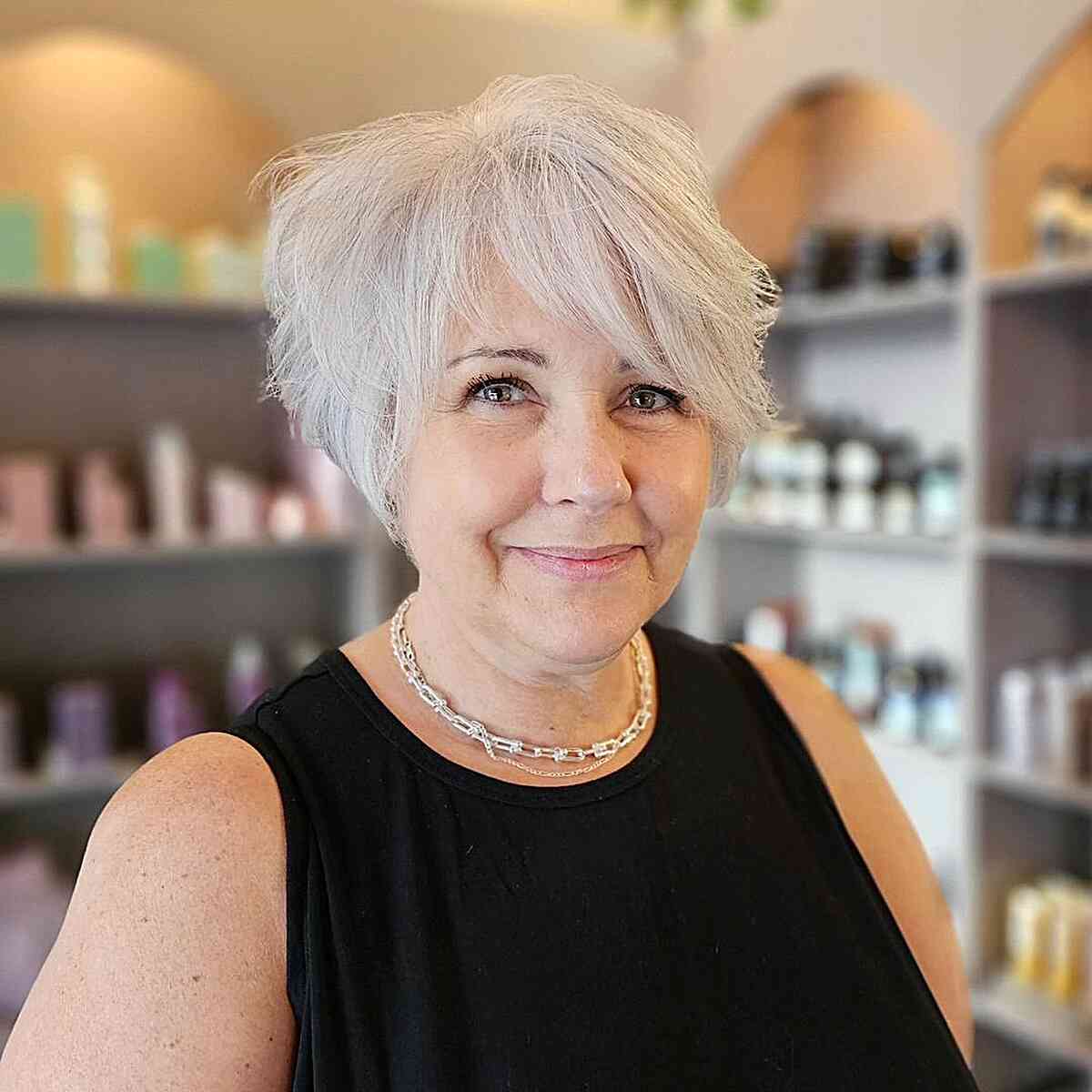 Tousled White Pixie with Side-Swept Bangs for Women Over 60