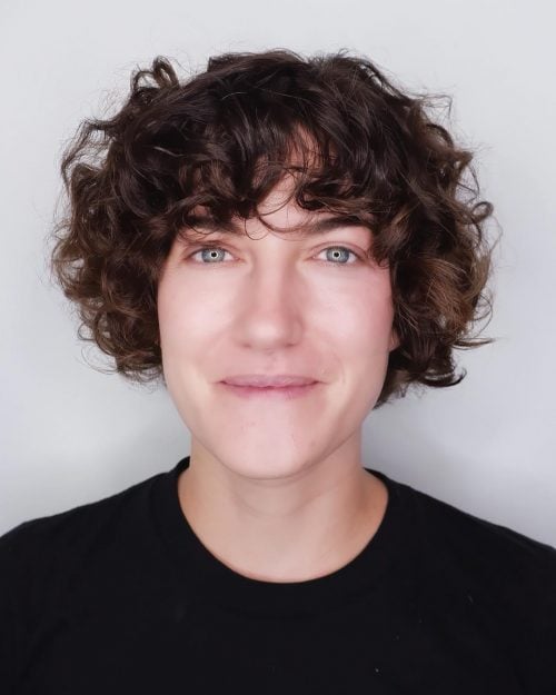 16 Cutest Curly Hair With Bangs To Try This Year