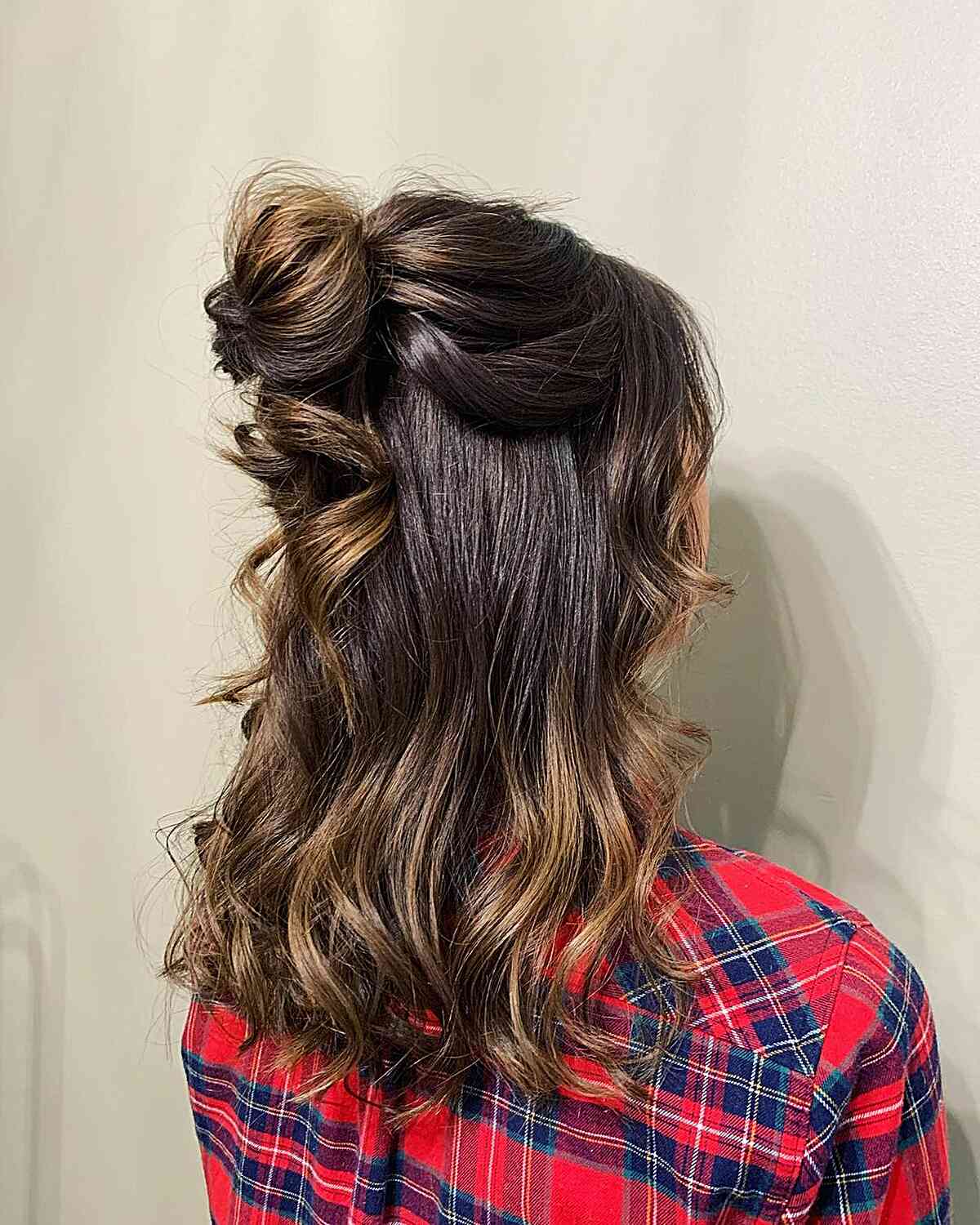 Trendy top messy bun shoulder length hair