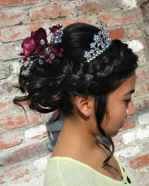 A quinceanera hairstyle is whatever hairdo worn on a daughter xv Stunning Quinceanera Hairstyles to Consider