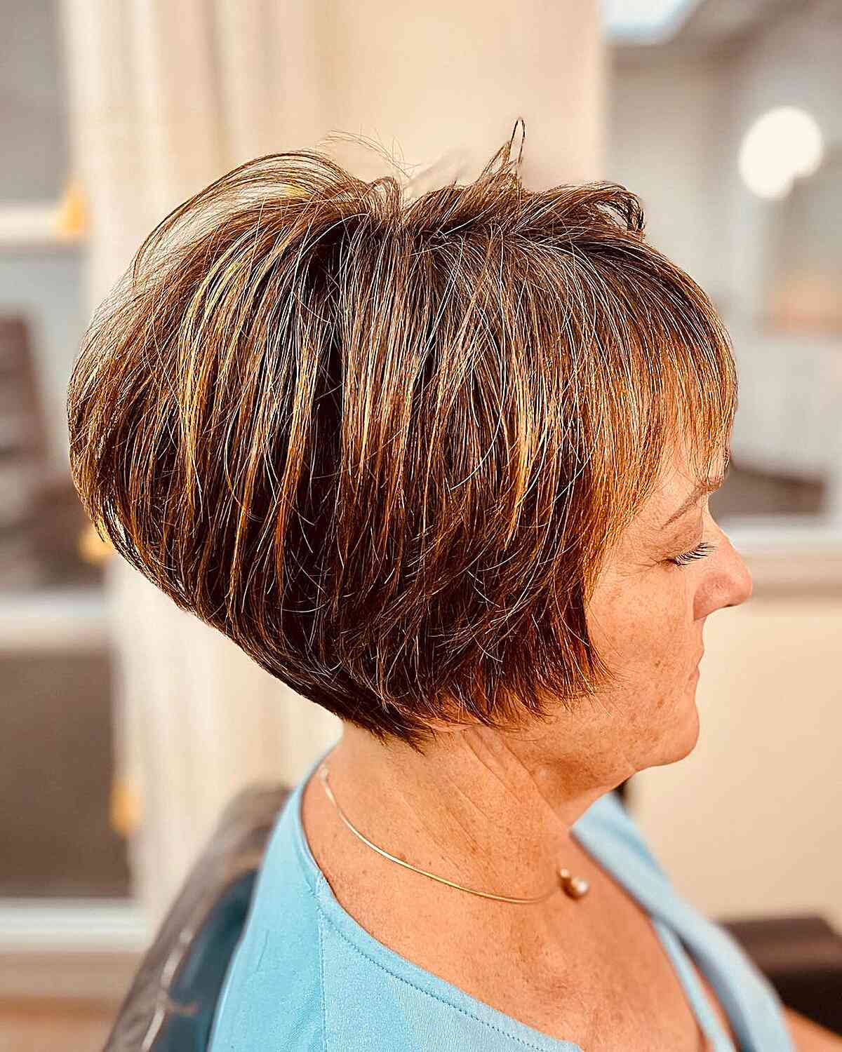 Very Short Pixie Bob with Stacked Layers and Straight Bangs for Women Over 70
