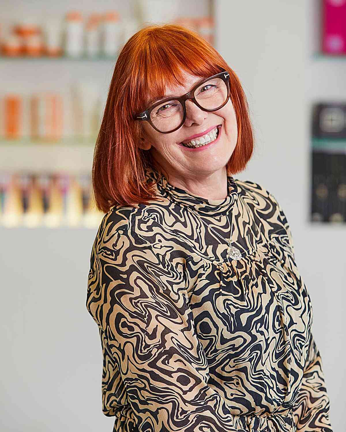 Neck-length Vivid Blunt Bob with Full Bangs for 50-year-old Ladies with Glasses