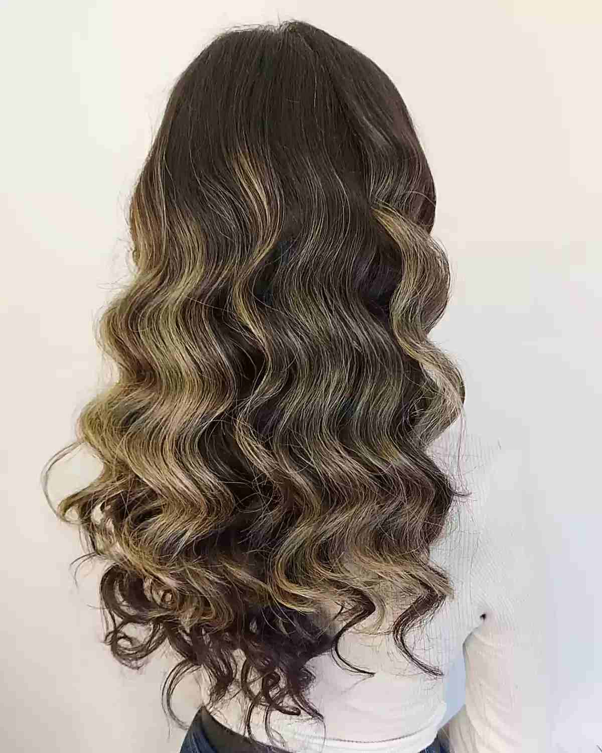 Waist-Length Hollywood Waves with Blonde Highlights
