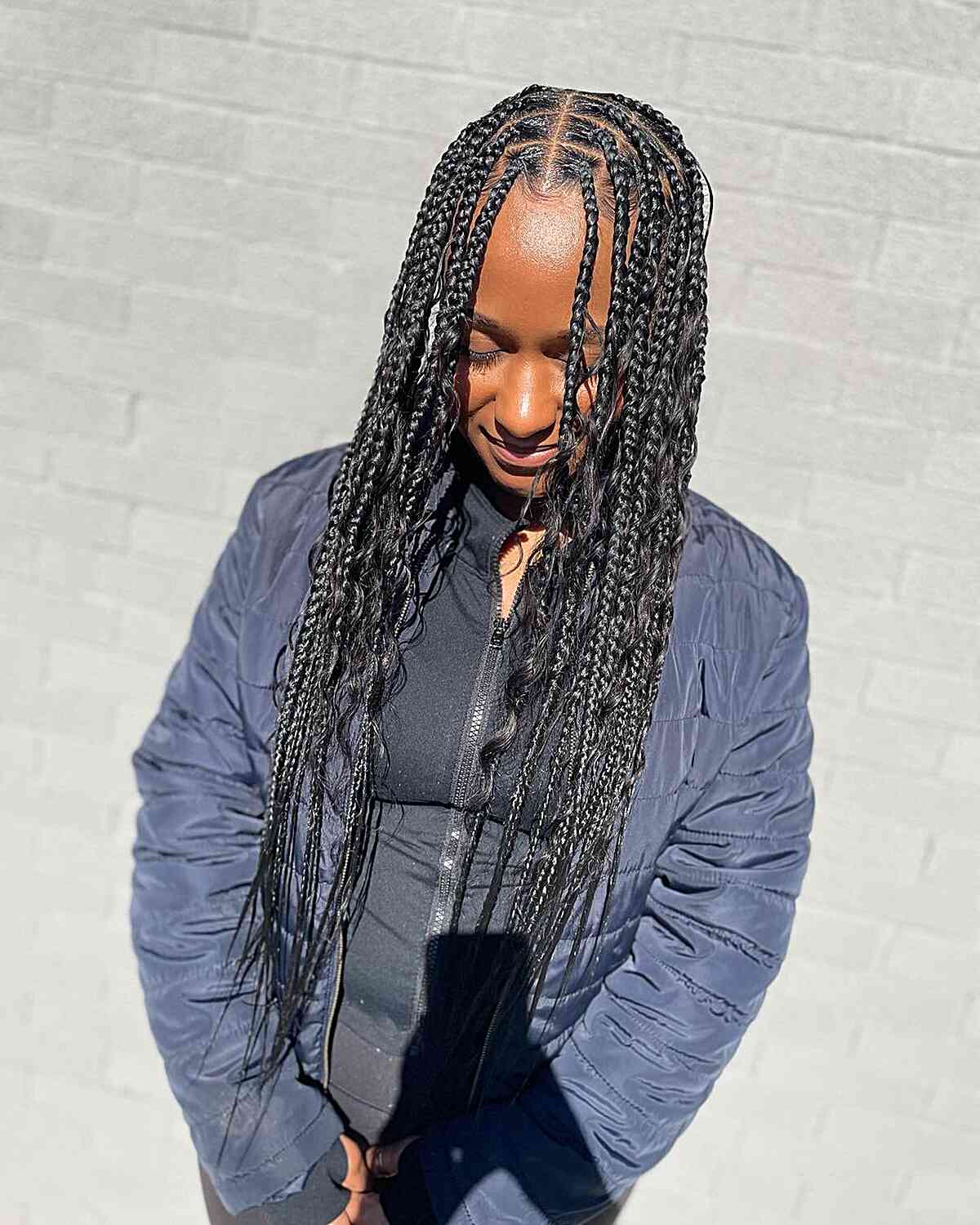 Waist-Length Medium Knotless Braids with Loose Waves and Middle Part