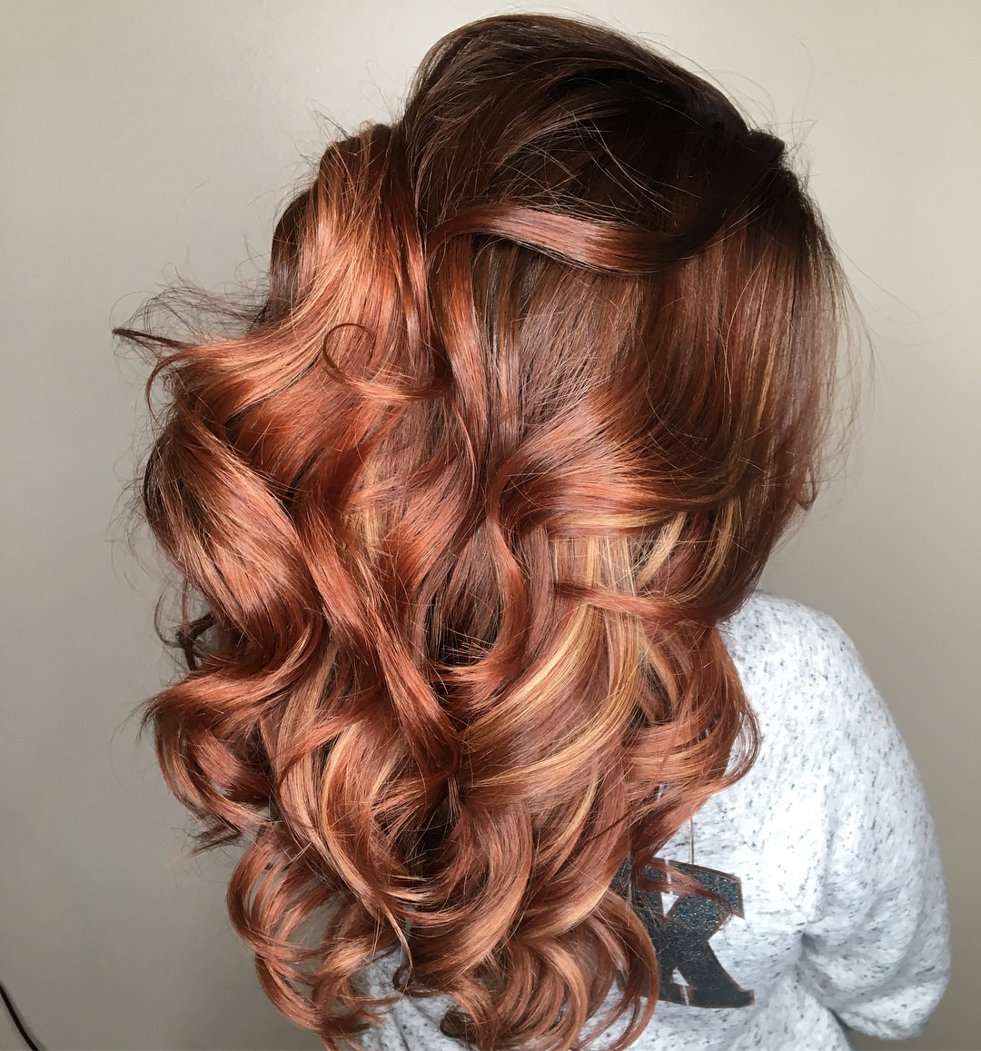 Dark auburn with blonde highlights